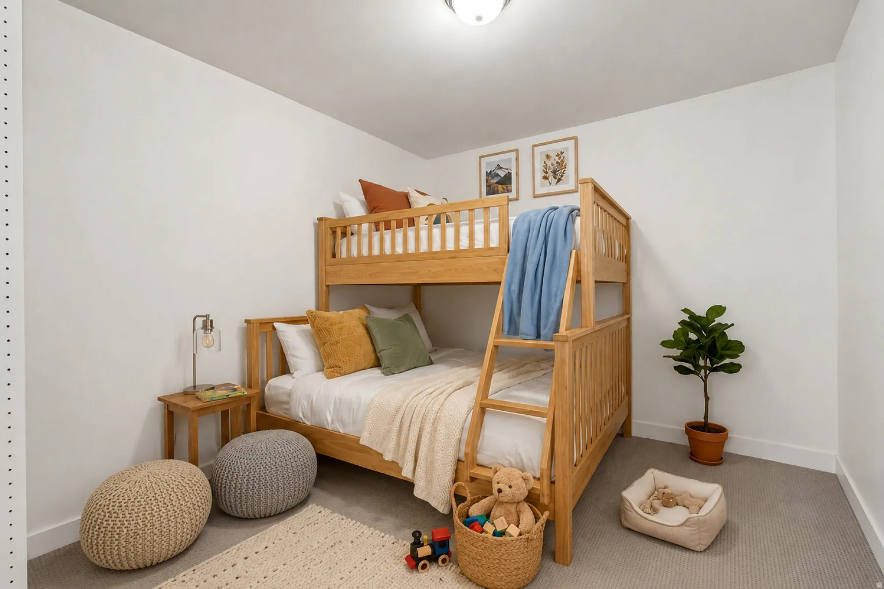 White-painted walls complement the light-toned wood bunk bed frame