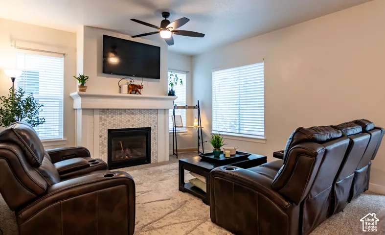 Living area with a fireplace featuring mosaic tile surround and a substantial mantel