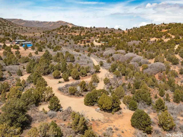 Expansive mountain landscape featuring natural desert vegetation