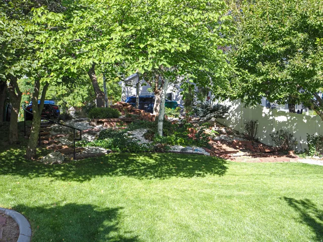 Manicured lawn with a decorative stone border