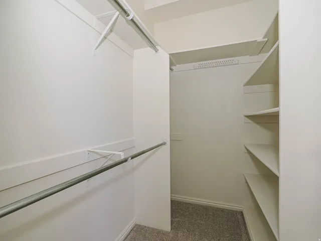 Built-in closet shelving and hanging rods