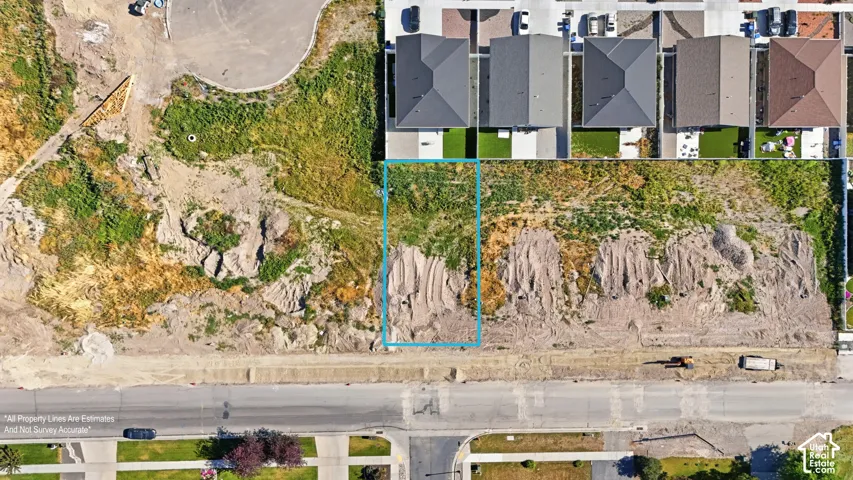 Vacant lot featuring a rectangular shape with visible boundary markings