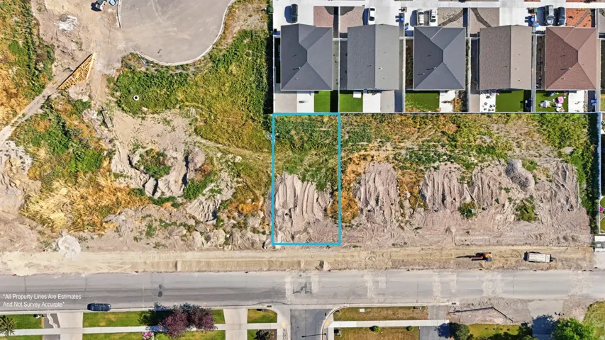 Vacant lot featuring a rectangular shape with visible boundary markings