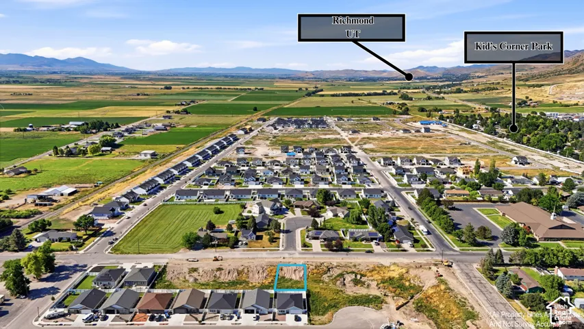 Aerial overview of a residential area featuring established homes and new construction