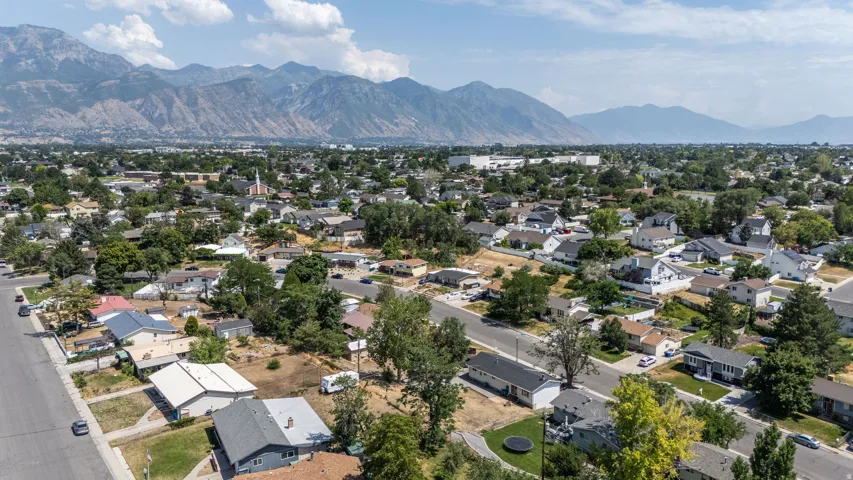 Expansive residential neighborhood featuring a variety of single-family homes with pitched roofs