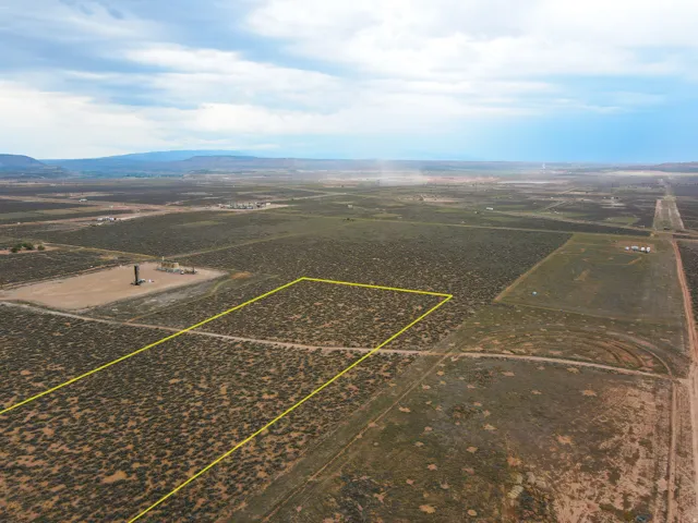 Expansive undeveloped land featuring natural vegetation and flat topography