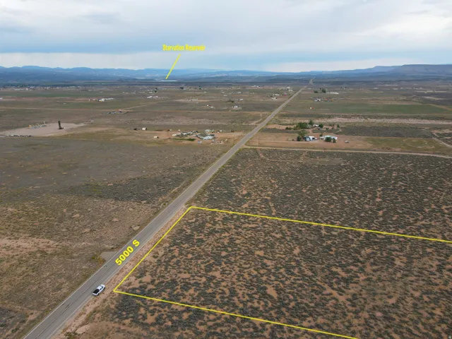 Expansive land parcel featuring direct road frontage on 5000 S, with a clear outline of the property boundaries