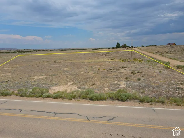 Expansive undeveloped land parcel featuring a natural, arid landscape