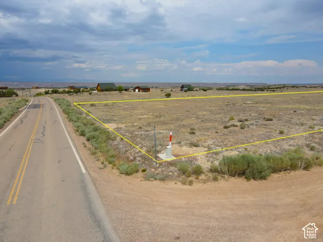 Expansive land parcel with direct paved road access