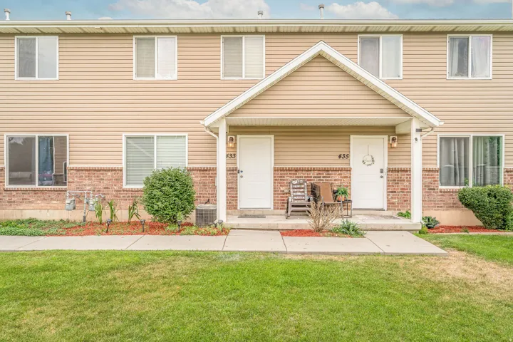 Multi-unit property with a brick and siding facade
