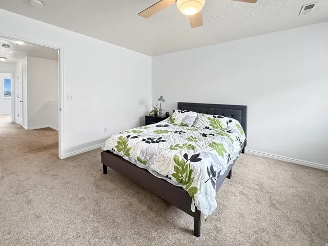 Neutral-toned carpeting throughout