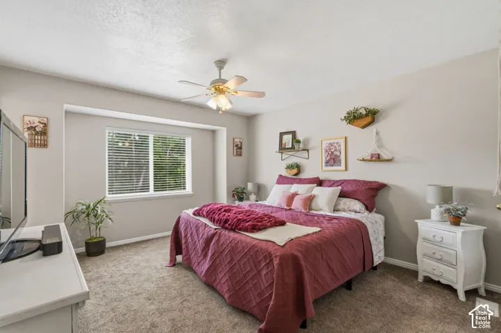 Primary Suite with Neutral tone walls with an accent window alcove