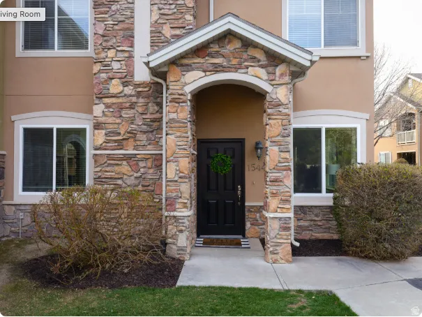 Stonework facade detailing a covered entryway
