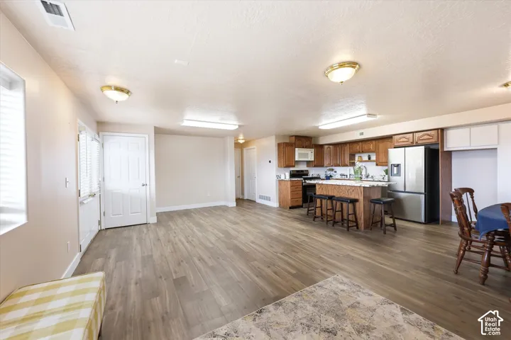 White door opens to stairway leading up to the main level. Can be locked if using the space as an ADU