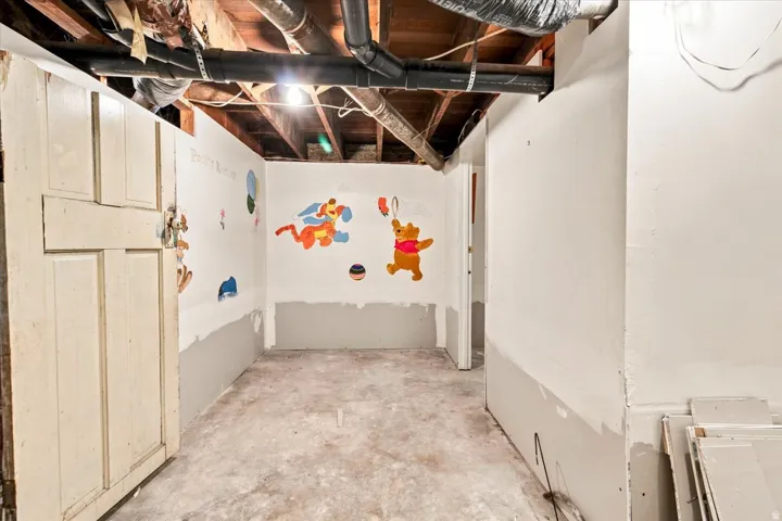Unfinished interior space featuring a concrete floor