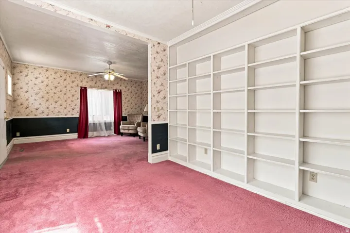 Expansive built-in shelving provides significant storage and display capability