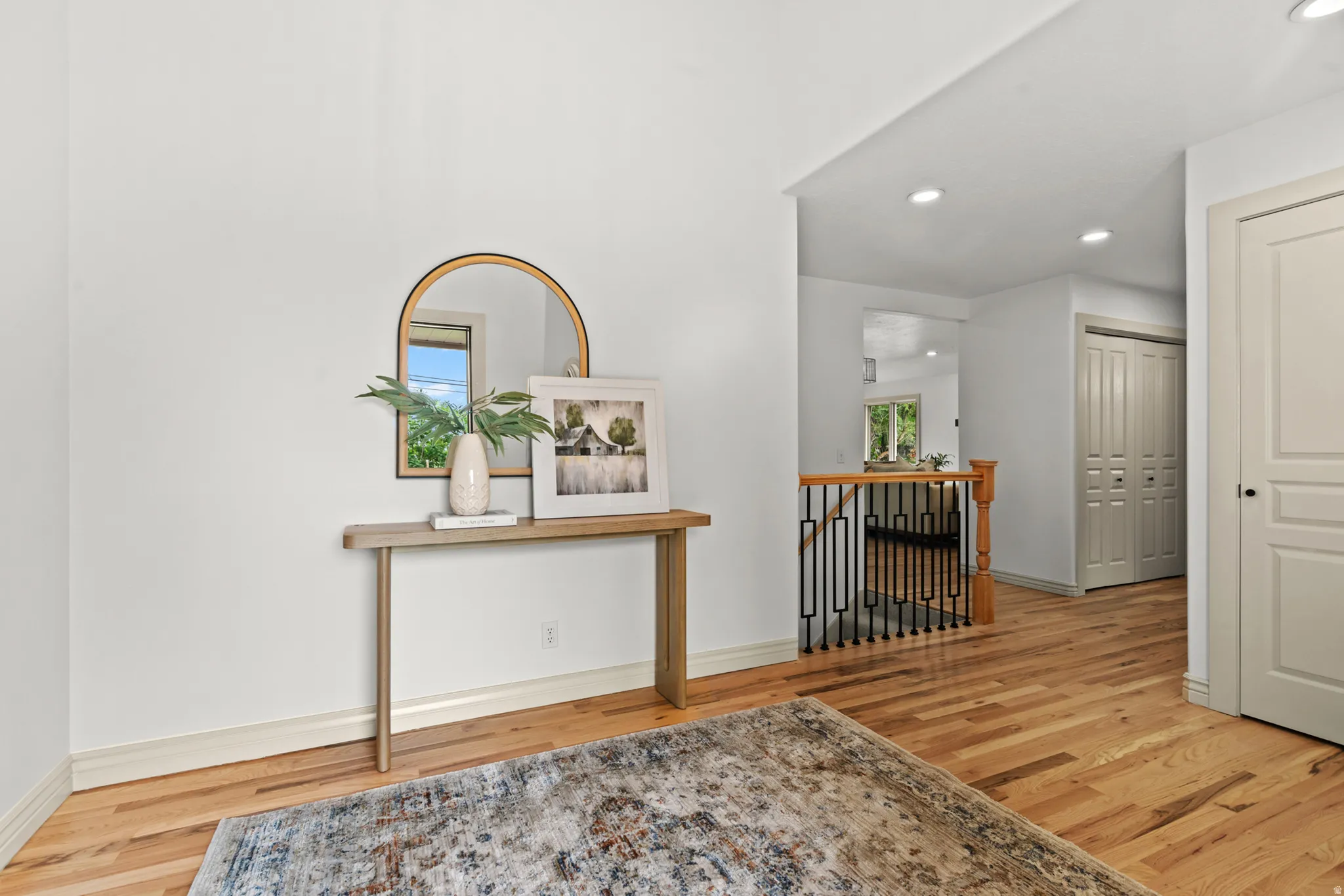 Wood flooring throughout main area