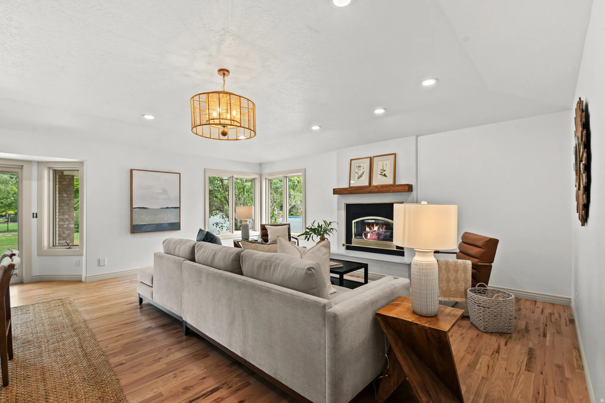 Great room with Venetian plaster gas log fireplace.