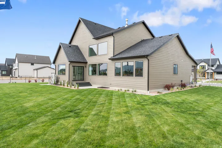 Modern two-story residence with horizontal siding and dark trim accents