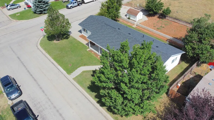 White exterior with dark gray roof