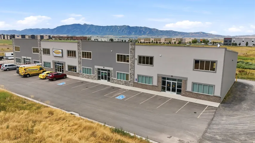 Modern commercial building featuring a stone and stucco facade