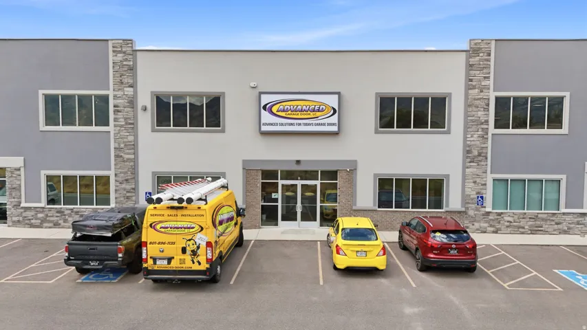 Modern commercial building featuring a stone and stucco facade