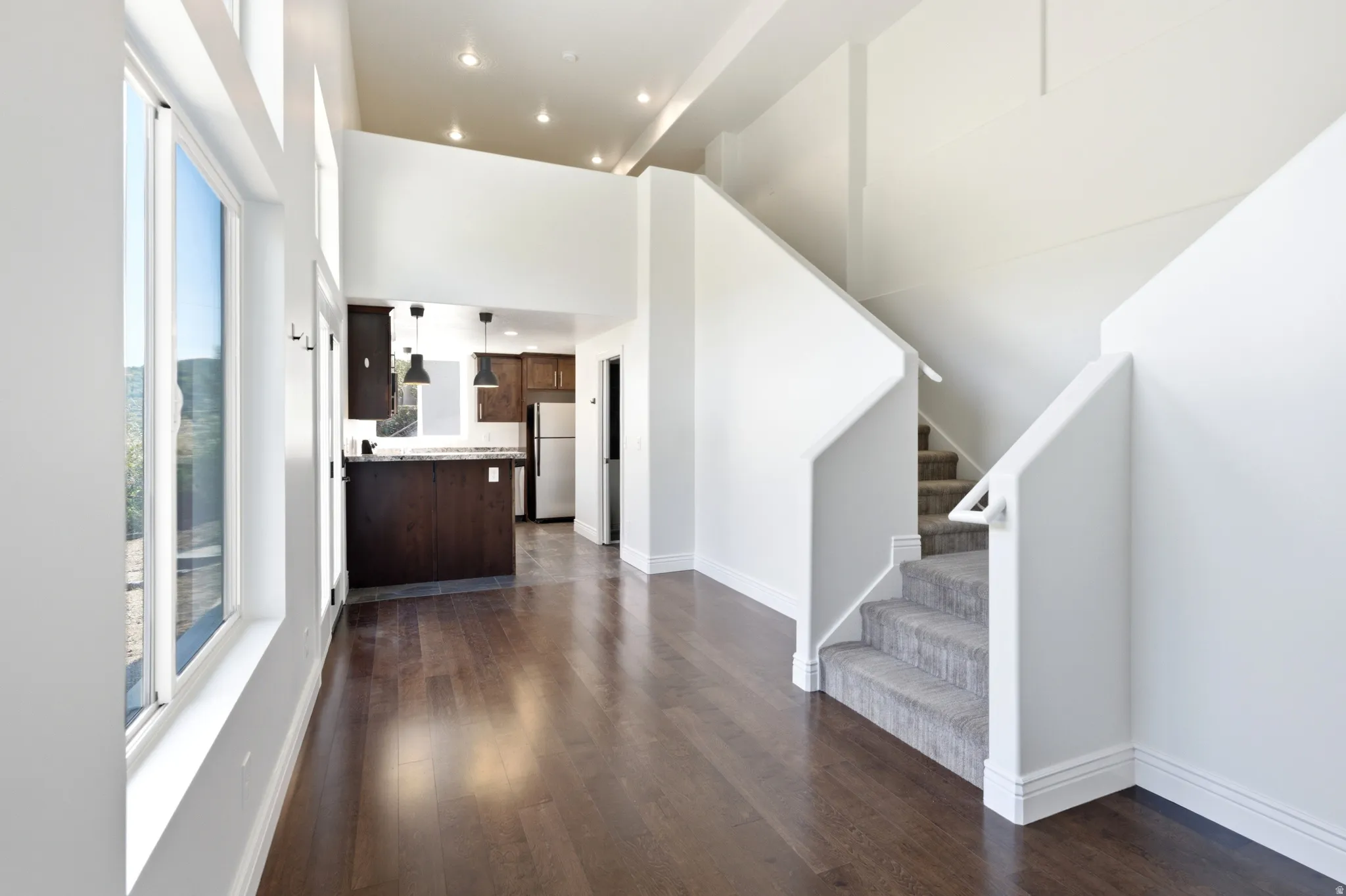 View of the steps to the den above the ADU kitchen