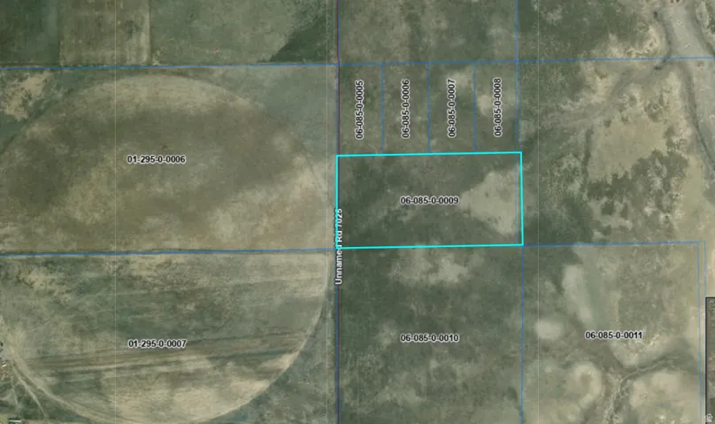 Aerial Plat Map. Indicating the parcel 06-085-0.0009 and surrounding land divisions