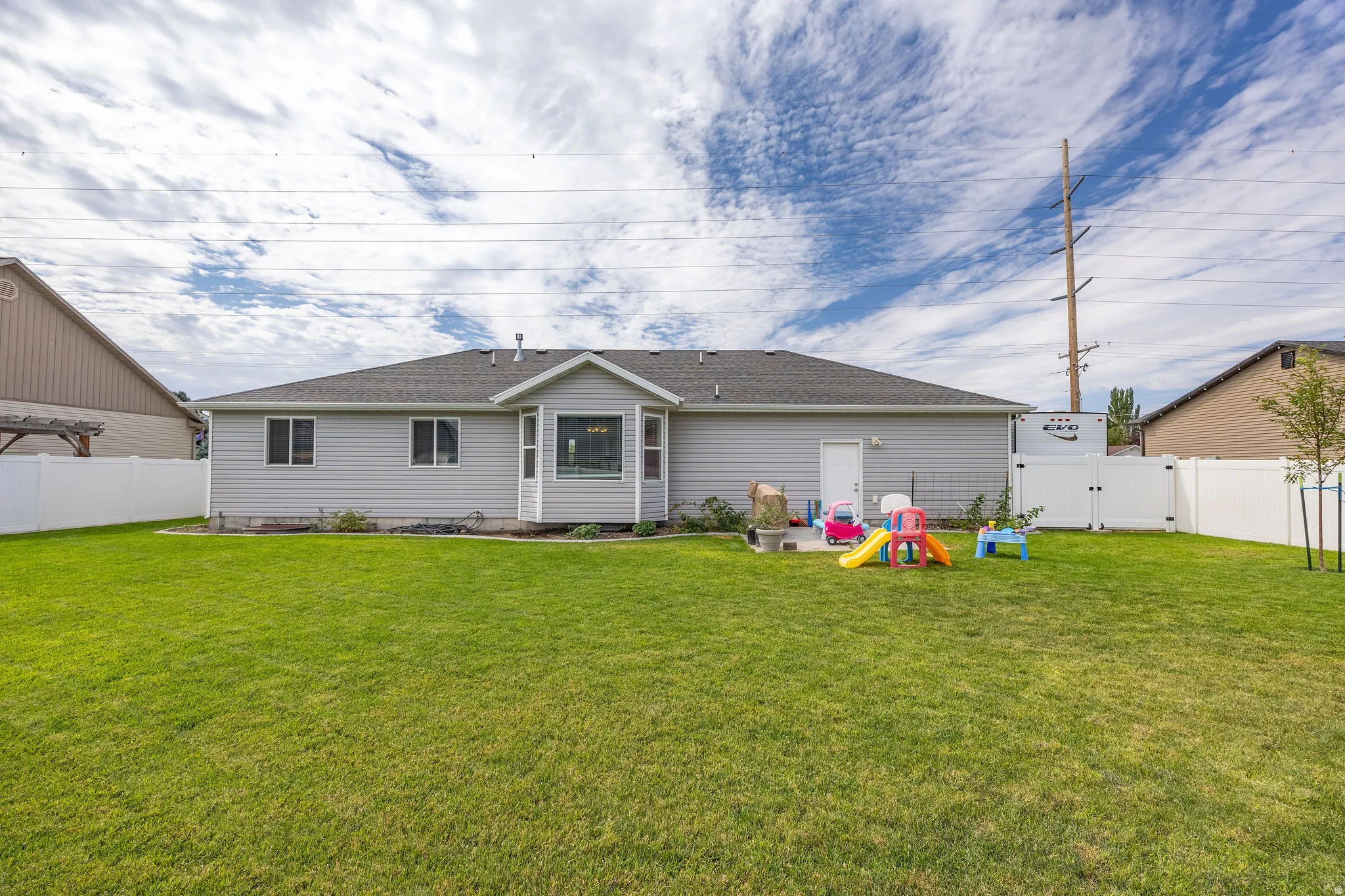 Expansive green lawn providing ample outdoor space
