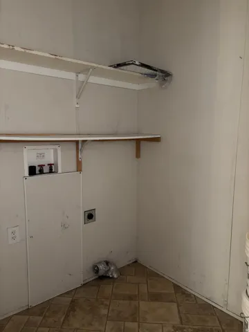 LAUNDRY ROOM IS OFF THE KITCHEN & HAS A SEPERATE ENTRANCE!