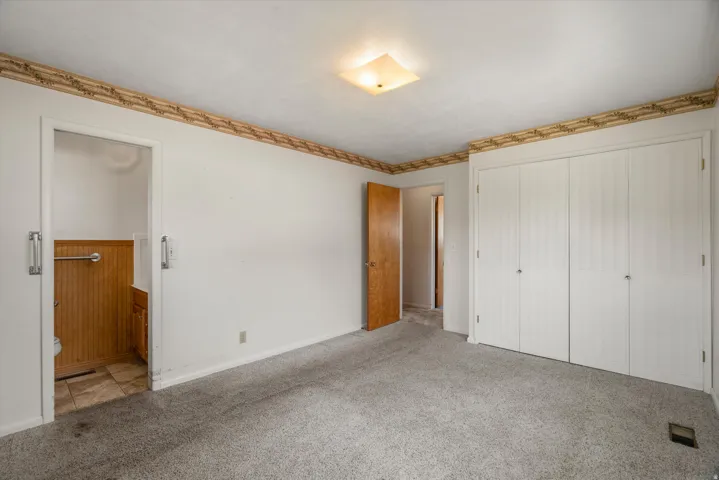Primary Bedroom with half Bath