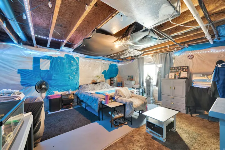 Set up as a bedroom, no walls.