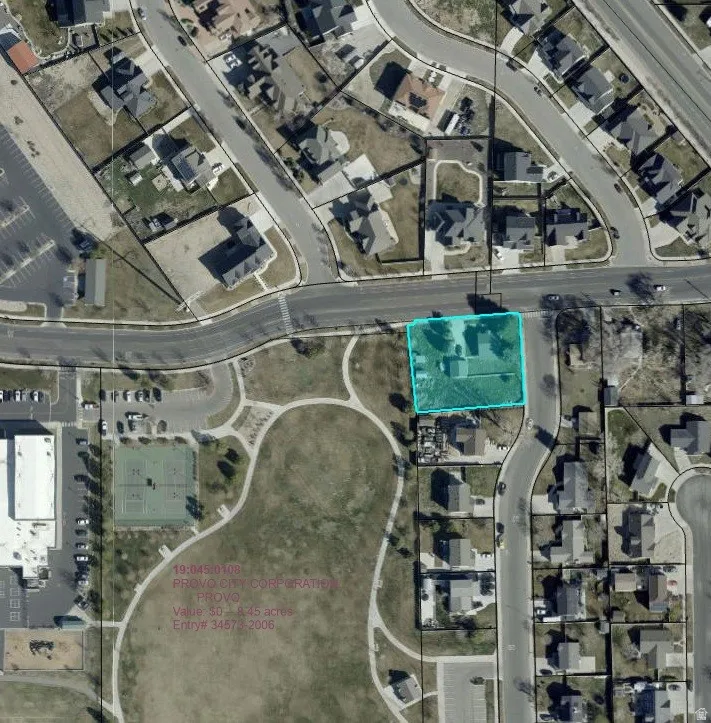 Aerial Parcel Map. Displaying the property boundary .  0.52 Acre corner lot.  Next to large public park and elementary school.