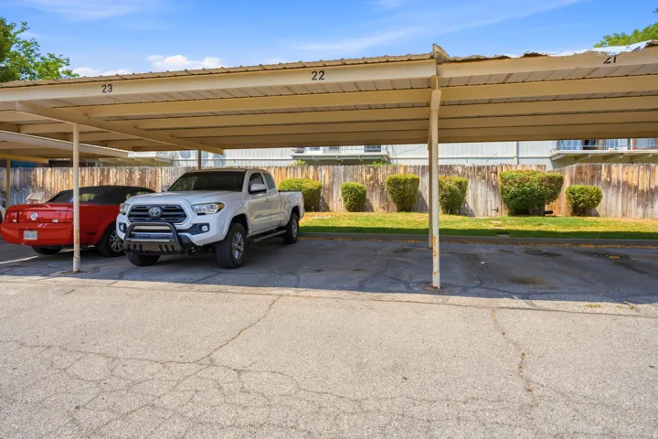 Covered parking structure with designated spaces