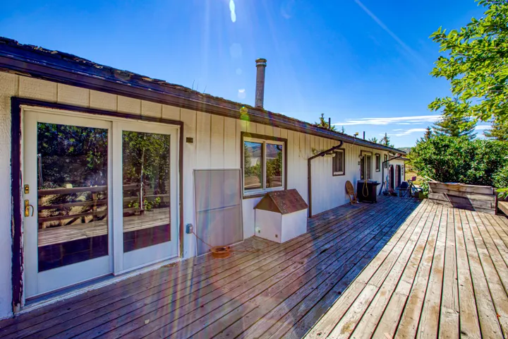 Expansive wooden deck providing substantial outdoor living space