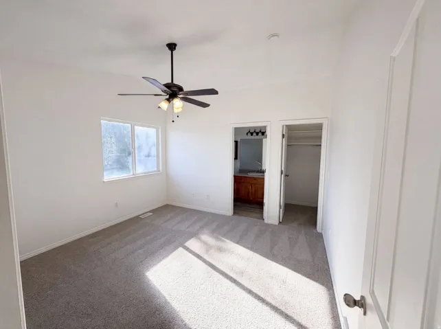 Neutral-toned carpeting throughout