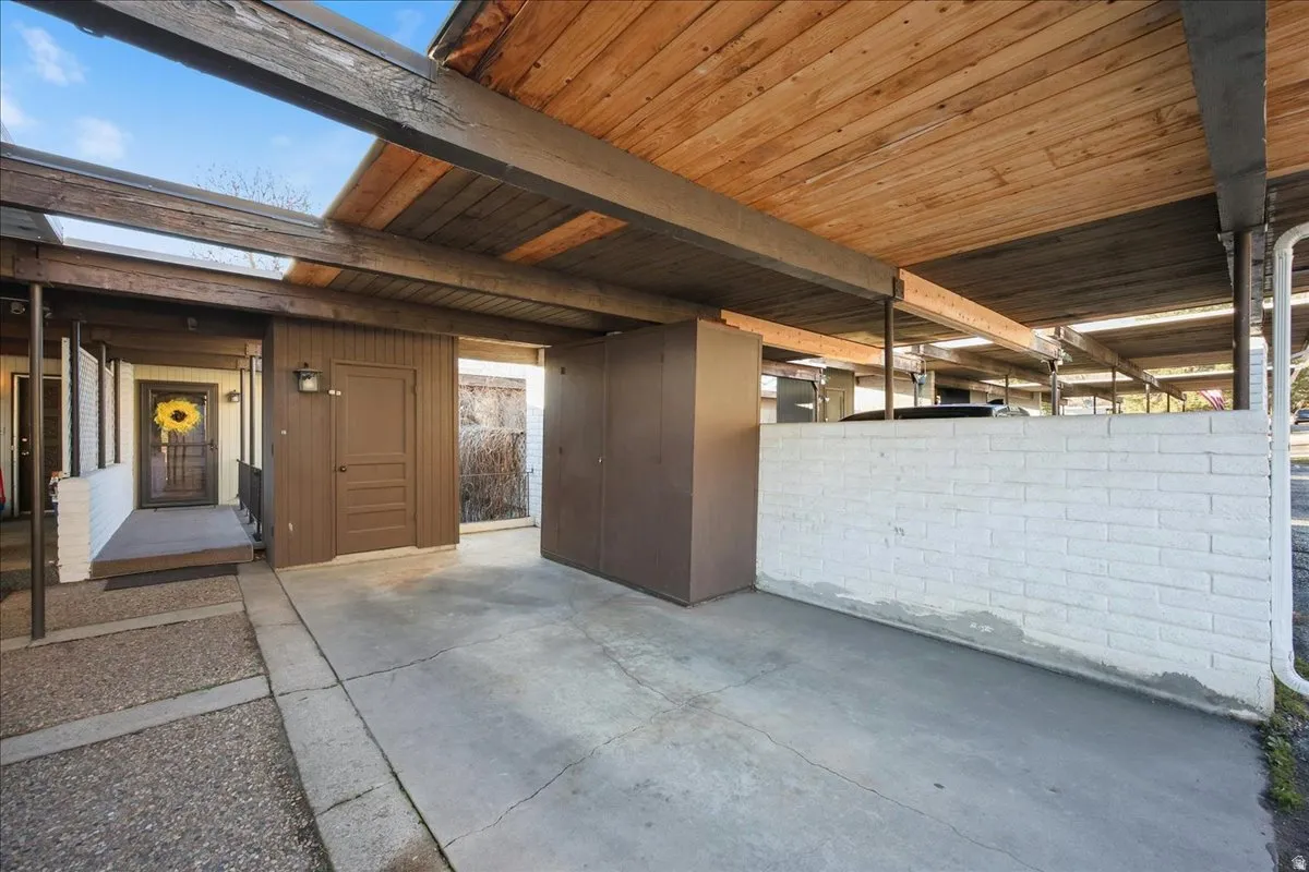 Enjoy private covered parking with additional storage in the carport, plus abundant guest and overflow parking