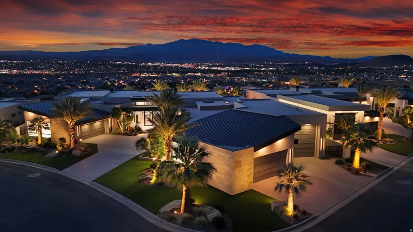 Modern architectural style residence featuring a dark-toned roofline and large windows