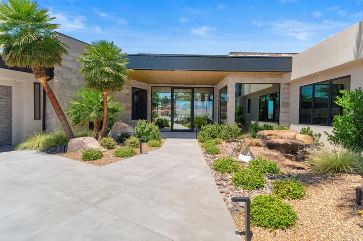 Modern architecture featuring a stone facade and stucco exterior