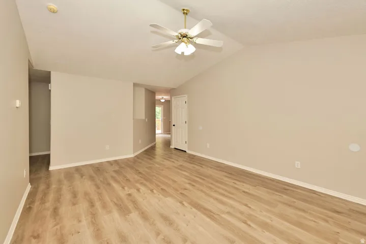 Vaulted ceiling with a ceiling fan light fixture