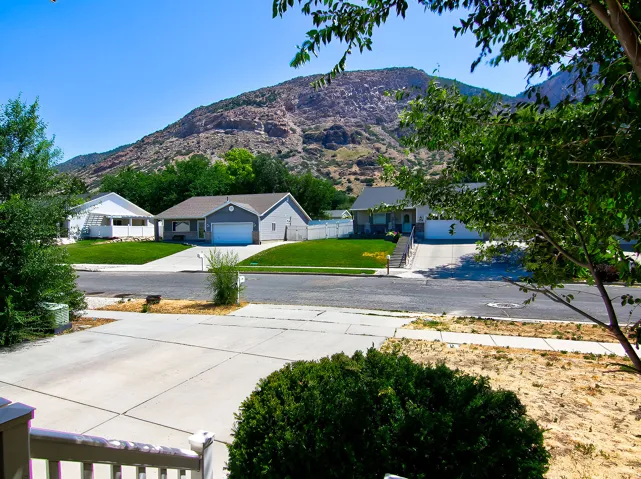 Mountain backdrop framing the neighborhood with residential structures