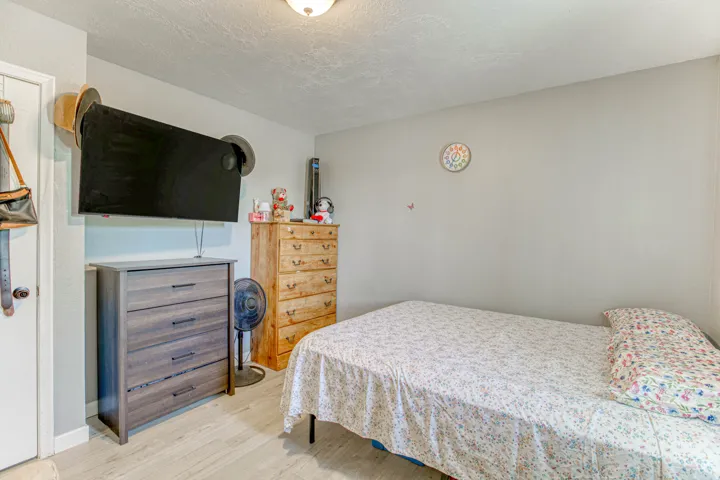 Neutral wall colors with wood-finish flooring