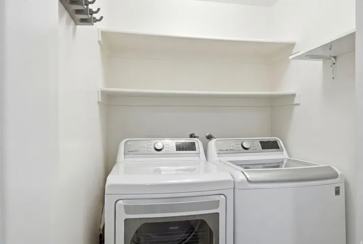 Private laundry room within unit.