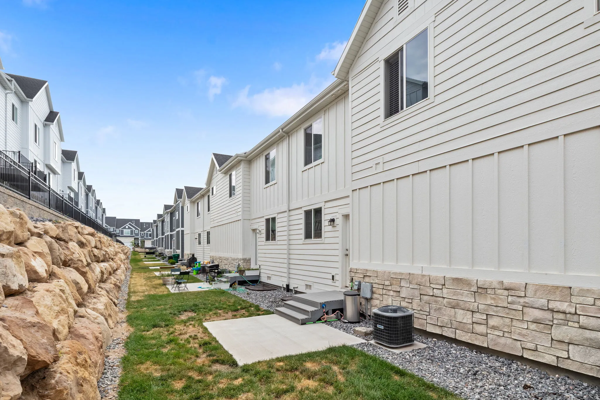 Exterior siding featuring horizontal panels and vertical board and batten accents