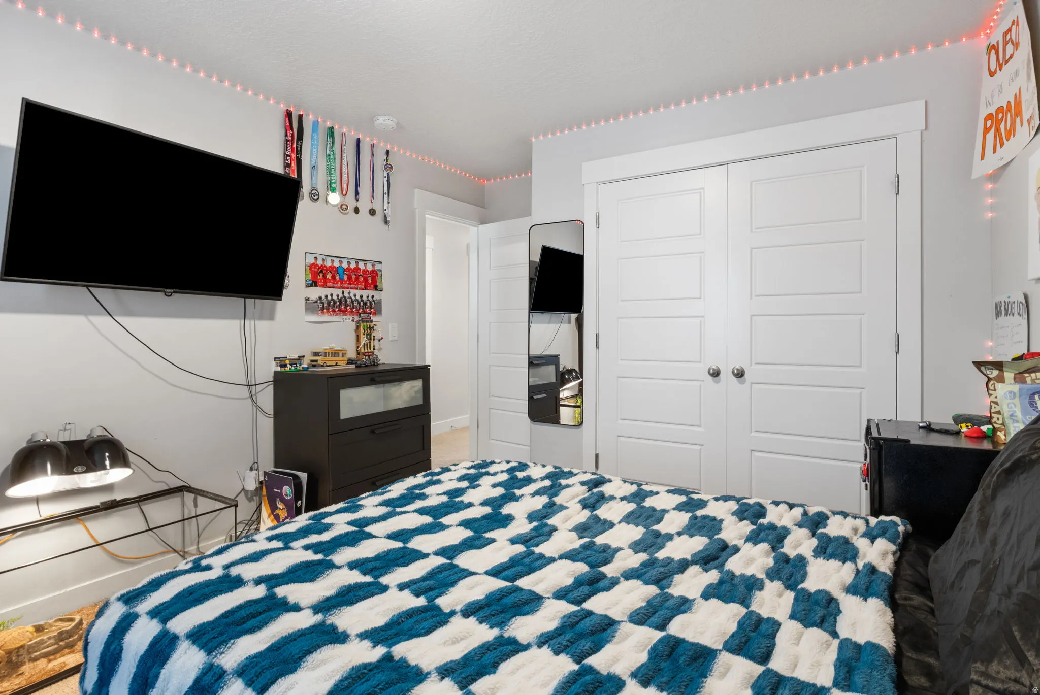 Bedroom featuring light grey walls and clean white trim