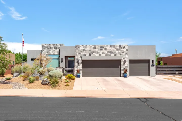 Contemporary stucco exterior with stone accents