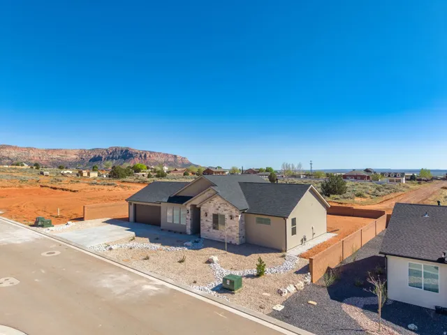 Newly constructed single-story residence featuring a two-car garage