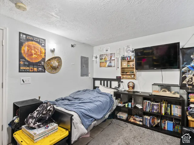 White painted walls with a textured ceiling