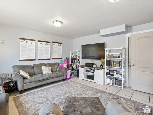 Light gray wall paint complemented by white trim and a paneled door