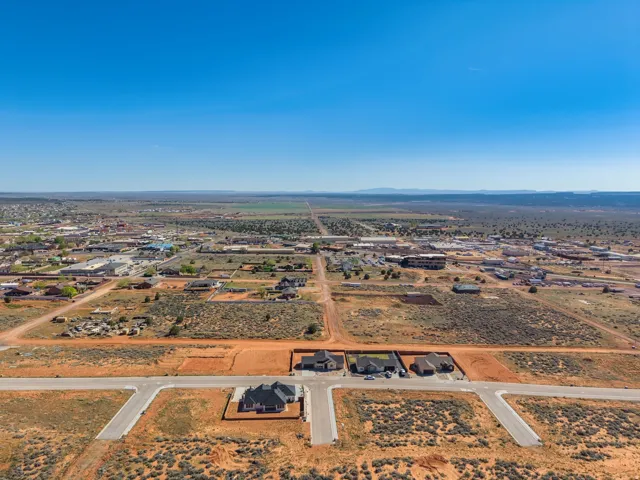Aerial perspective showcasing a residential development with newly constructed homes